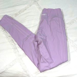 Two pairs of Alphalete leggings.